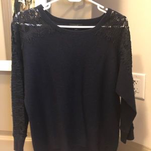 Navy J Crew sweater with lacy sleeve detail